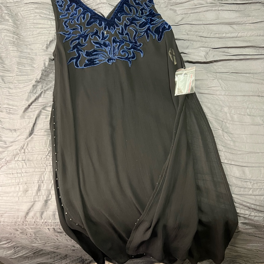 Free people long sheer slits on both sides